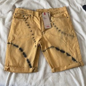 Levi’s 511 slim shorts, size 34, yellow/black